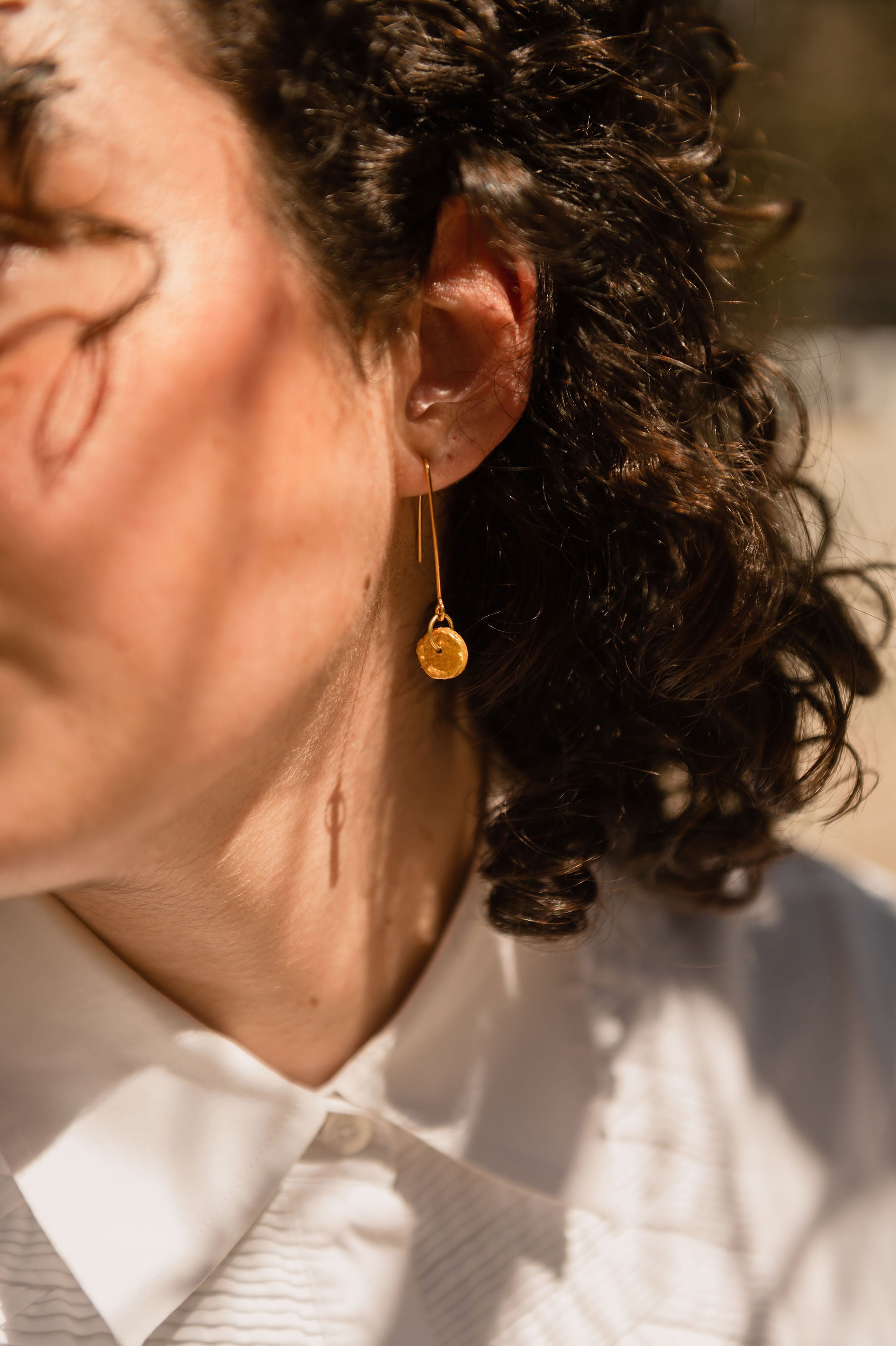 Coccinelle Earrings Orange Skin on model 